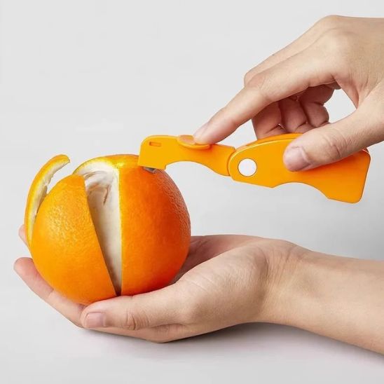 Éplucheur orange Gestsimple, vos mains restent propres.