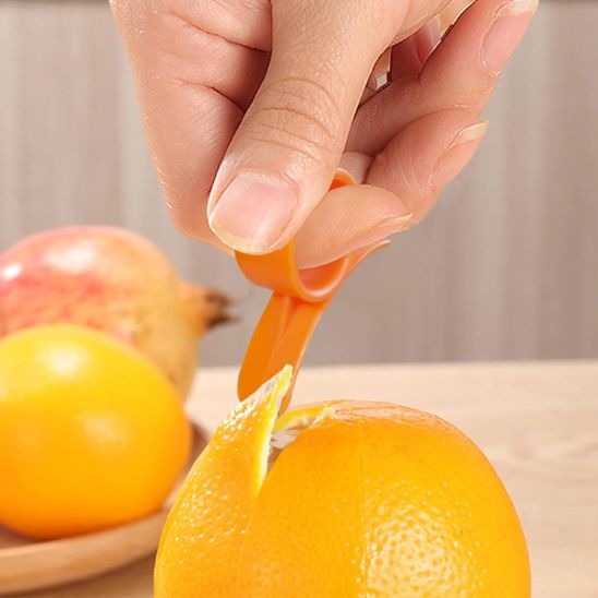 Éplucheur orange Anneauactif, impossible de vous blesser.