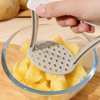 Presse-purée ergonomique robuste, glisse sans effort en cuisine