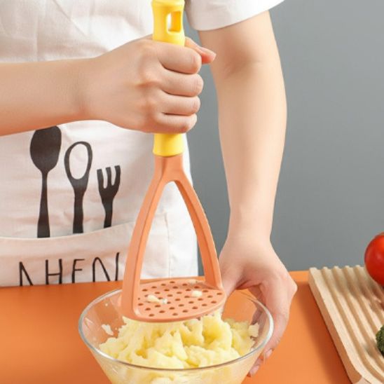 Presse-purée, pureoncteuse, de couleur orange