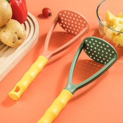Presse puree pureoncteuse, la poignée bicolore confortable